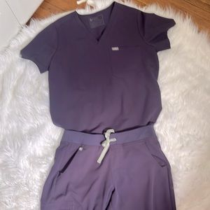 Figs scrubs brand new, large top , and medium petite bottoms.